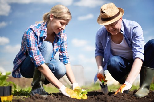 Professional gardening tools and a lush landscape in Northolt