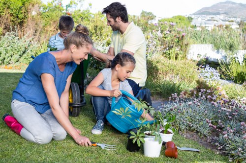 Community gathering near a vibrant garden in Mitcham