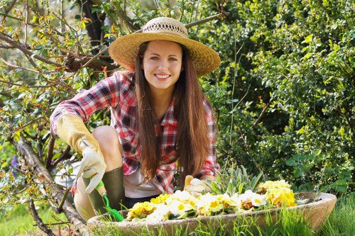 Portrait of prominent local gardeners in a vibrant green setting